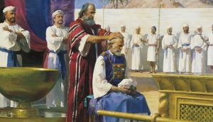 Mojžíš předává Aronovi kněžství