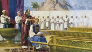 Mojžíš předává Áronovi kněžství, obraz od Harryho Andersona
